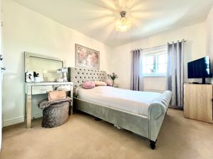 Bedroom One- click for photo gallery